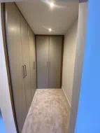 Fitted floor to ceiling wardrobes with a Grove design in Super Matt Stone Grey, installed in Yarm